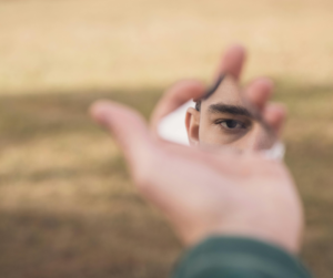 Living in a Spotlight: The Unrelenting Pressure of Identity and Perfection in the Modern World